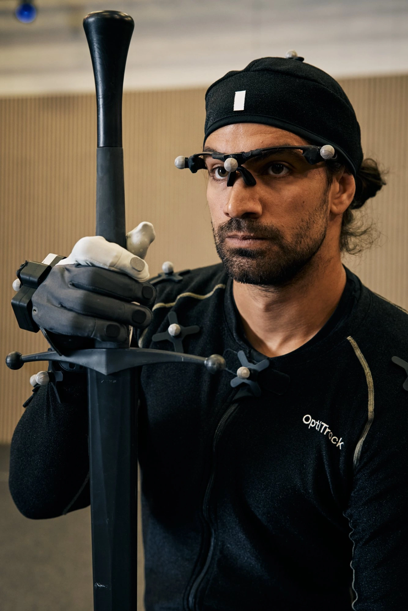 Motion capture performer aiming prop