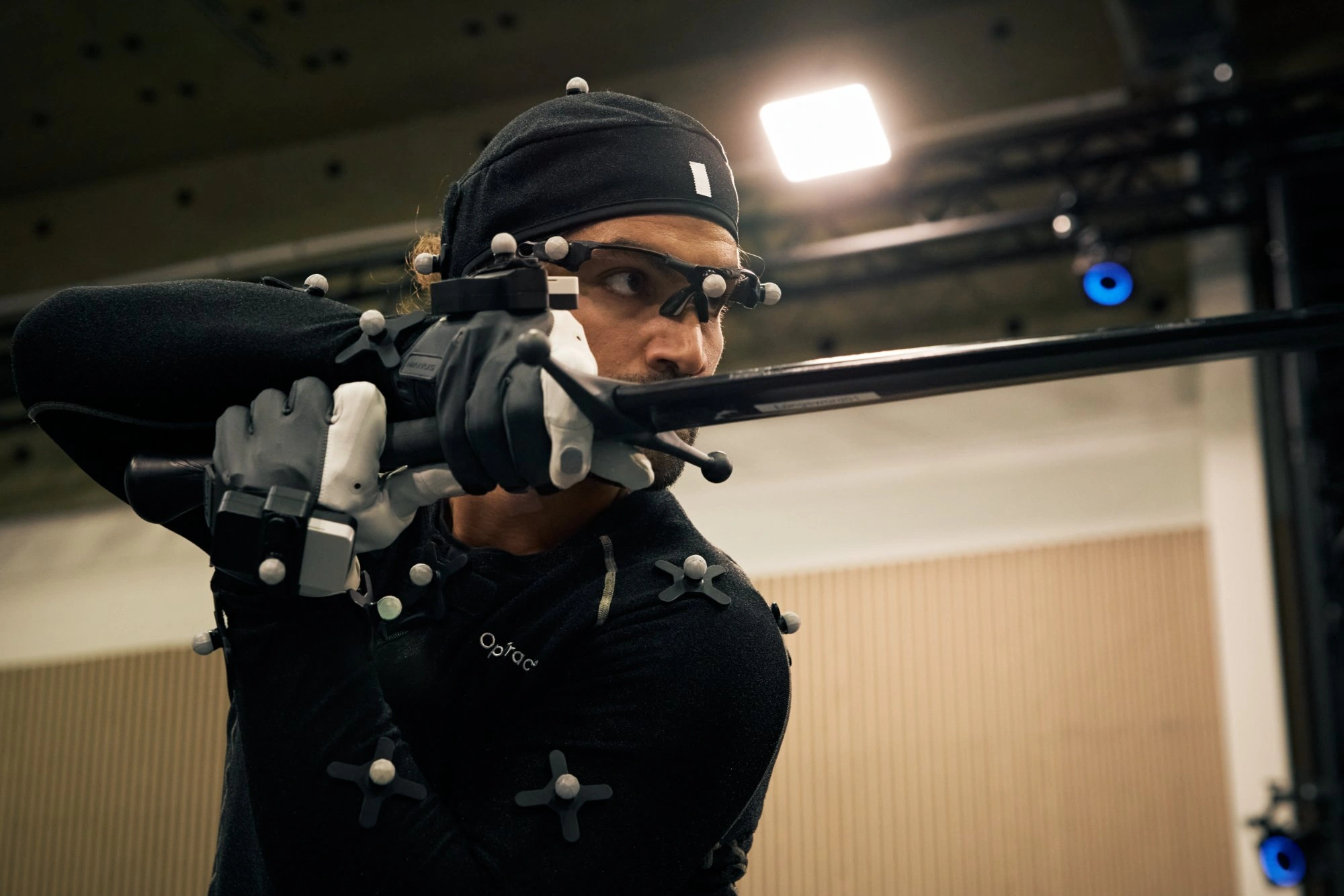 Motion capture performer with prop weapon