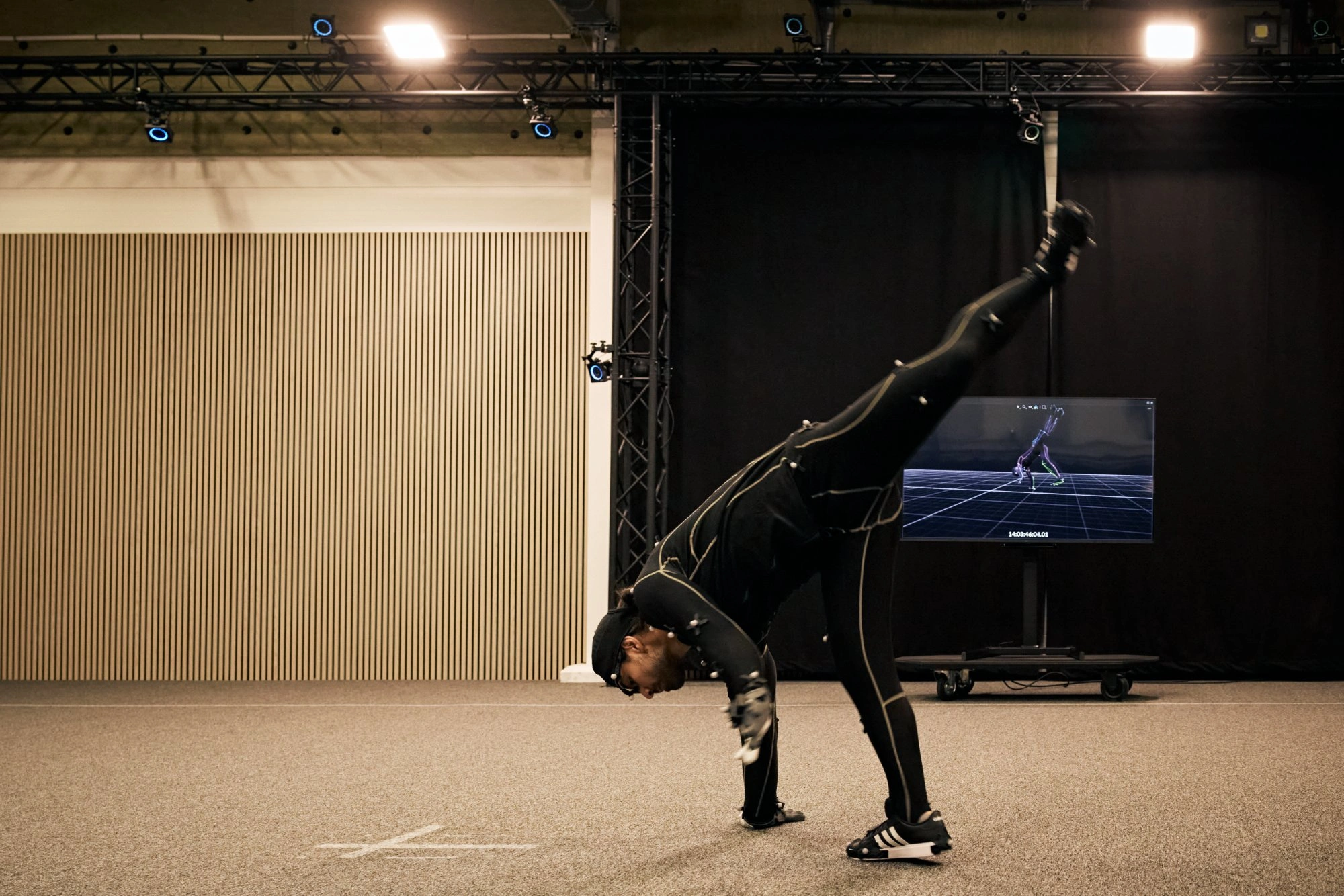 Motion capture performer holding sword